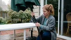 What that hole in your plastic patio table is actually for